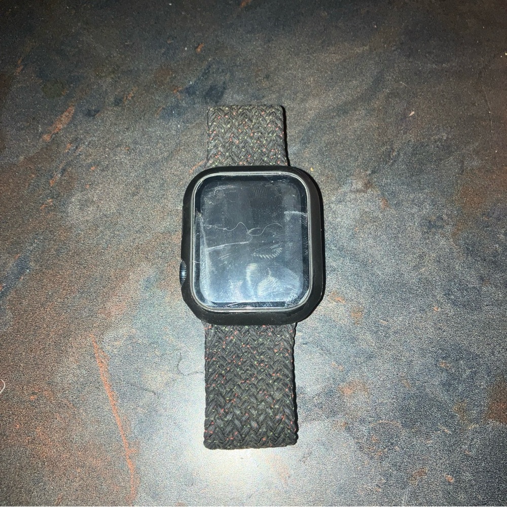 Apple smartwatch with cotton wrist band. Sold as is